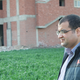 Mohamed El Garhey outside the hospital building site.